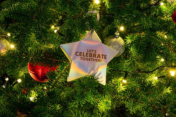 Ornament that says: Let's Celebrate Together